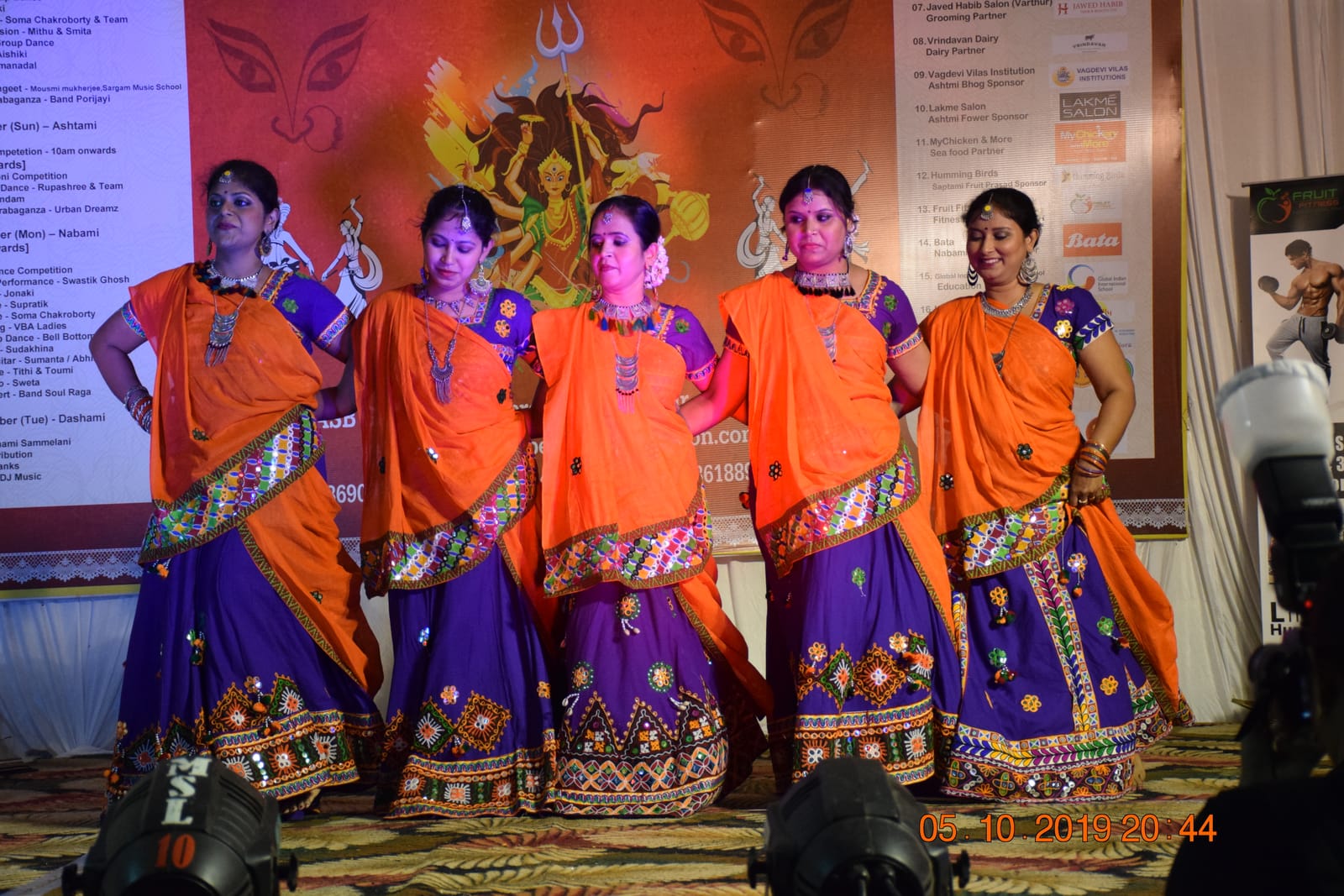 VBA members performing a cultural dance at Durga Puja
